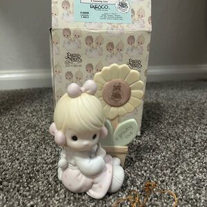 Precious Moments Figurine with Pink and Cream Accents